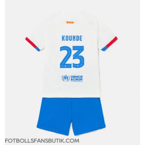 Barcelona Jules Kounde #23 Replika Bortatröja Barn 2023-24 Kortärmad (+ Korta byxor)